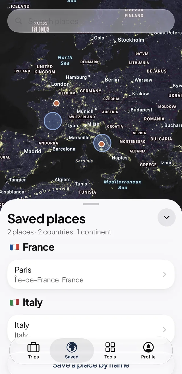 Mapia Saved tab on a flat map of Europe listing Paris, France and Italy.